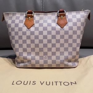 Authentic white Louis Vuitton